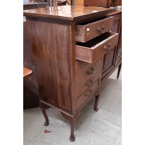 2483 - A small 19th century mahogany hall cupboard with twin panelled doors enclosing a shelved interior, r... 