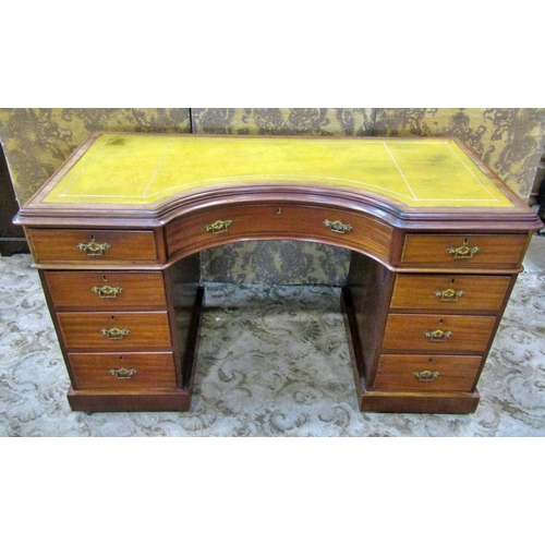 2304 - A Victorian mahogany writing desk fitted with an arrangement of eight frieze drawers, a central dumm... 