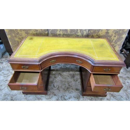 2304 - A Victorian mahogany writing desk fitted with an arrangement of eight frieze drawers, a central dumm... 