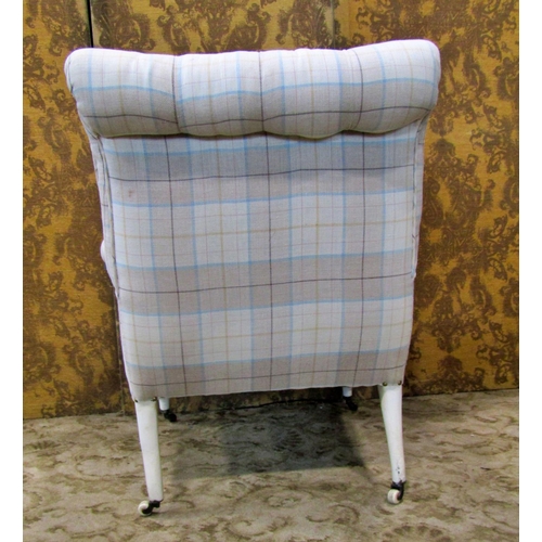 2318 - An upholstered easy chair with button back on turned supports