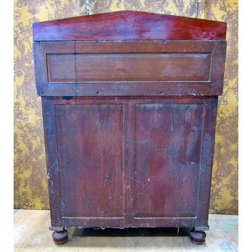 2327 - A William IV  mahogany chiffonier enclosed by a pair of arched panelled doors and a frieze drawer wi... 