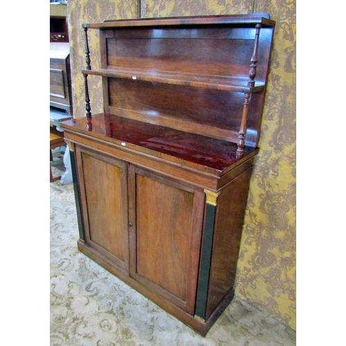 2328 - A Regency rosewood chiffonier enclosed by two panelled doors, raised back incorporating two shelves ... 