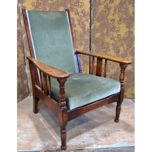 2332 - An Arts & Crafts oak reclining chair with re-upholstered finish