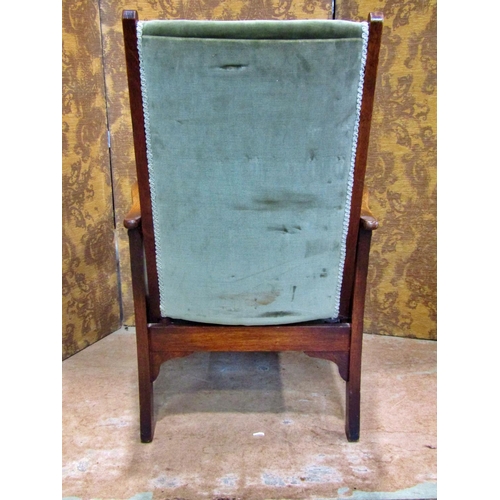 2332 - An Arts & Crafts oak reclining chair with re-upholstered finish