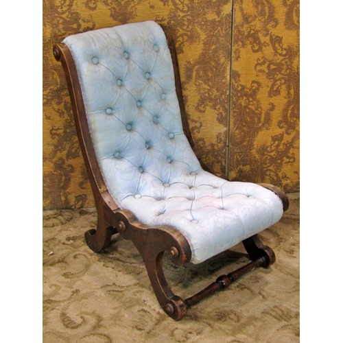 2333 - A Victorian mahogany drawing room chair with scrolled outline