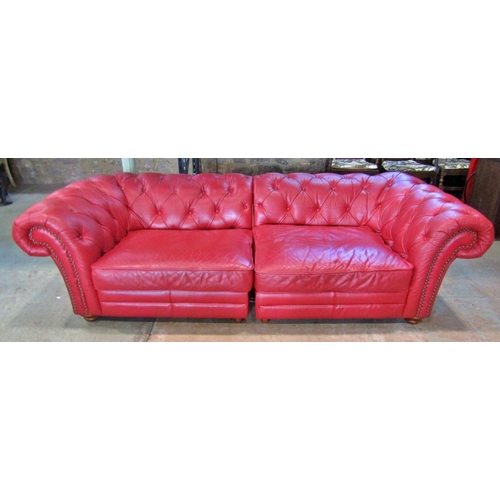 2344 - A Victorian style Chesterfield sofa with button finish, upholstered in a red leather colourway, 240 ... 