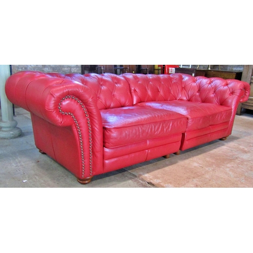 2344 - A Victorian style Chesterfield sofa with button finish, upholstered in a red leather colourway, 240 ... 