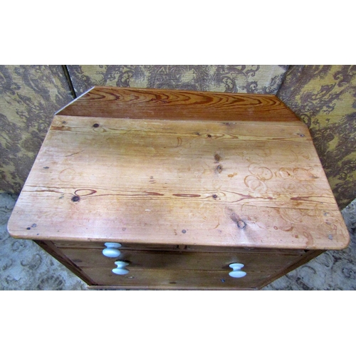 2361 - A Victorian stripped and waxed pine chest of two deep and two shallow drawers with stripped and waxe... 