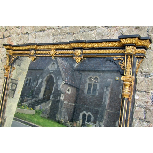 2399 - A very large Victorian overmantle mirror, the decorative frame with original black and gilt paintwor... 