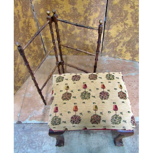 2184 - An Edwardian dressing stool with later re-upholstered rectangular seat raised on claw and ball suppo... 