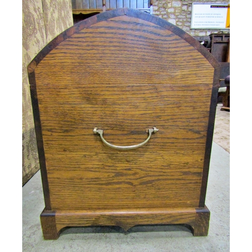 2200 - An oak domed top chest with pierced brass lasp and drop side carrying handles, 103 cm long x 53 wide... 