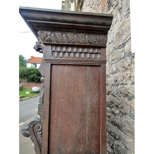 2207 - A mid 19th century continental pier cabinet the lower section enclosed by carved and panelled door w... 