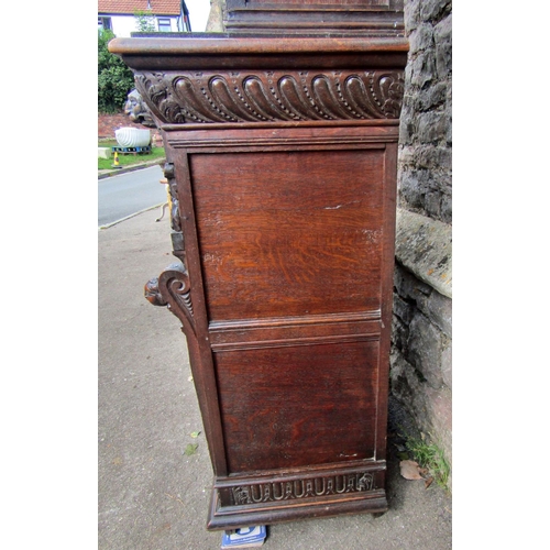 2207 - A mid 19th century continental pier cabinet the lower section enclosed by carved and panelled door w... 