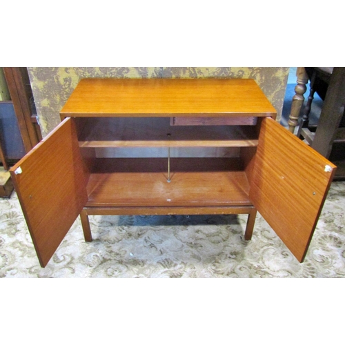 2256 - A mid century teak side cabinet enclosed by two panelled doors with cutlery tray within 90 cm wide