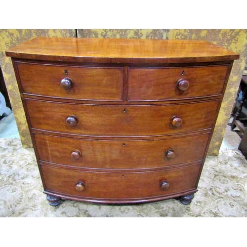 2264 - A Victorian mahogany bow fronted chest of three long and two short drawers on turned supports, 120 c... 