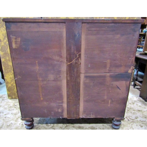 2264 - A Victorian mahogany bow fronted chest of three long and two short drawers on turned supports, 120 c... 