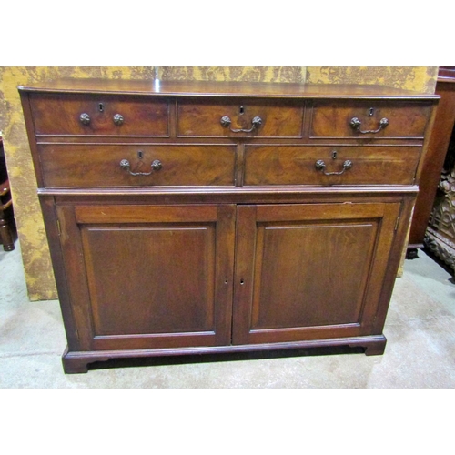 2266 - A Georgian mahogany secretaire, the front elevation enclosed by a pair of panelled doors enclosing t... 