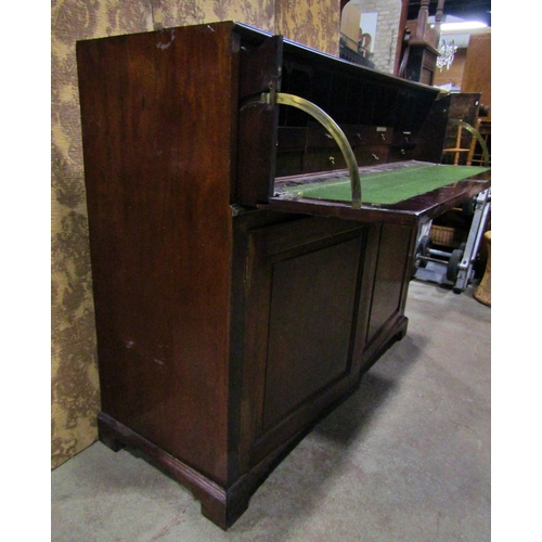 2266 - A Georgian mahogany secretaire, the front elevation enclosed by a pair of panelled doors enclosing t... 