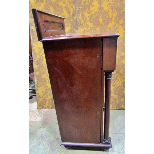 2268 - Regency mahogany pedestal, the lower section enclosed by a panelled door flanked by turned and taper... 