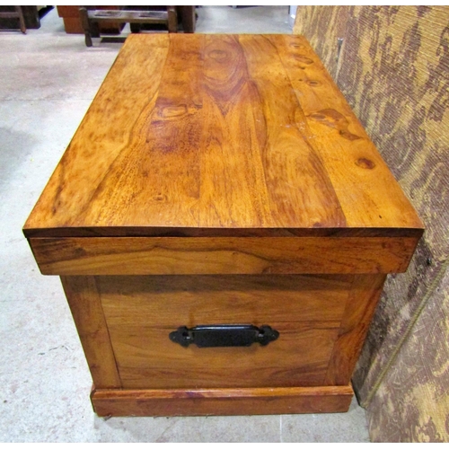 2273 - An Indian hardwood coffer of simple construction with overhanging top