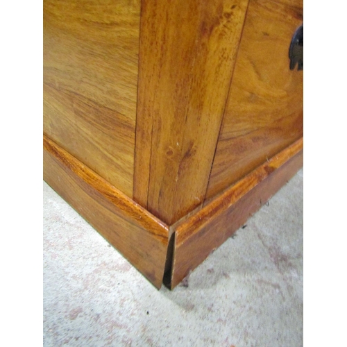 2273 - An Indian hardwood coffer of simple construction with overhanging top