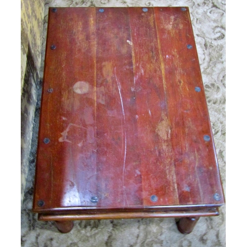 2276 - An Indian hardwood occasional table with steel bands on turned supports, 87cm max