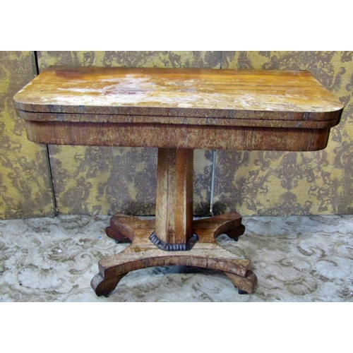 2279 - A Regency rosewood foldover top card table raised on a tapering hexagonal pillar and platform