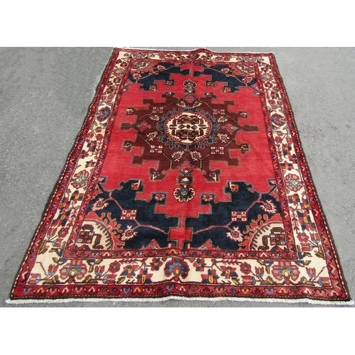 2707 - A north west Persian Tafresh rug, with a central medallion design repeating outwards to a running fl... 