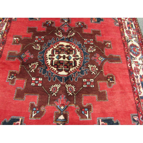 2707 - A north west Persian Tafresh rug, with a central medallion design repeating outwards to a running fl... 