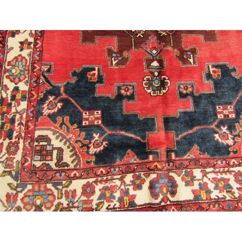 2707 - A north west Persian Tafresh rug, with a central medallion design repeating outwards to a running fl... 