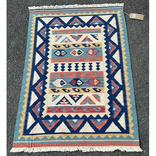 2731 - A North African Kilim Rug, with tribal design in pastel tones, 83 x 180 cm