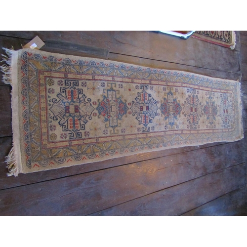 2728 - An eastern wool rug with beige ground, seven medallion centre within simple running borders, 280cm x... 