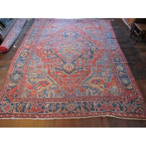 2734 - Good old Heriz wool carpet with lozenge shaped medallion, upon alternating blue and red ground panel... 