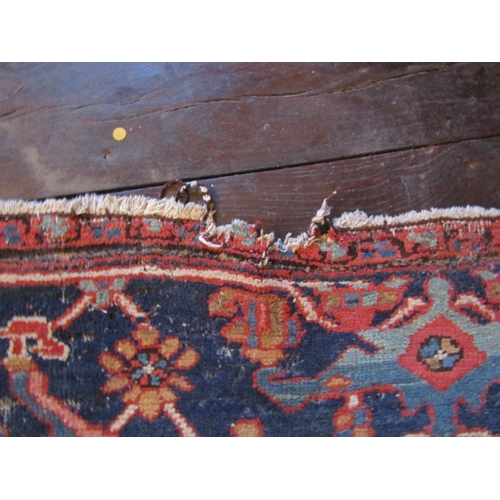 2734 - Good old Heriz wool carpet with lozenge shaped medallion, upon alternating blue and red ground panel... 