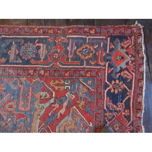 2734 - Good old Heriz wool carpet with lozenge shaped medallion, upon alternating blue and red ground panel... 