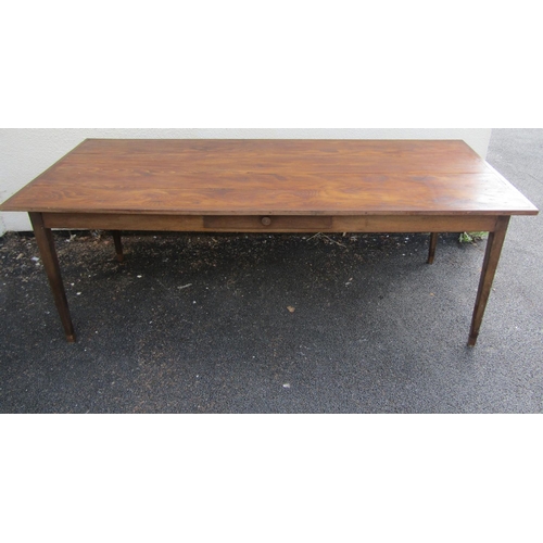 2514 - A provincial farmhouse kitchen table, principally in oak on slender square tapered supports with cen... 