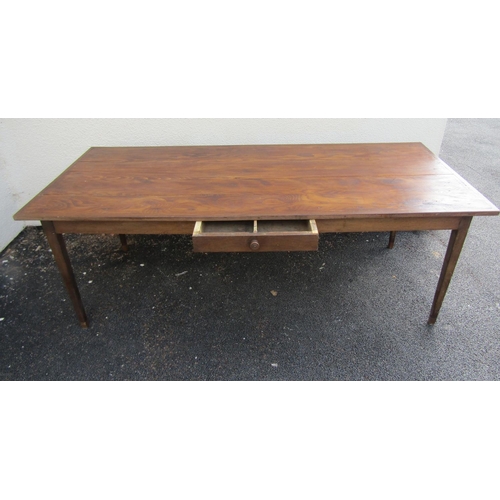 2514 - A provincial farmhouse kitchen table, principally in oak on slender square tapered supports with cen... 