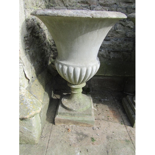 2084 - A pair of good quality weathered cast composition stone Campana shaped garden urns with flared rims ... 