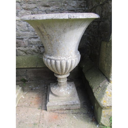 2084 - A pair of good quality weathered cast composition stone Campana shaped garden urns with flared rims ... 