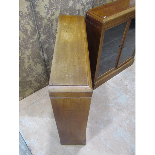 2182 - A pair of early 20th century walnut floorstanding dwarf side cabinets/bookcases with inlaid crossban... 