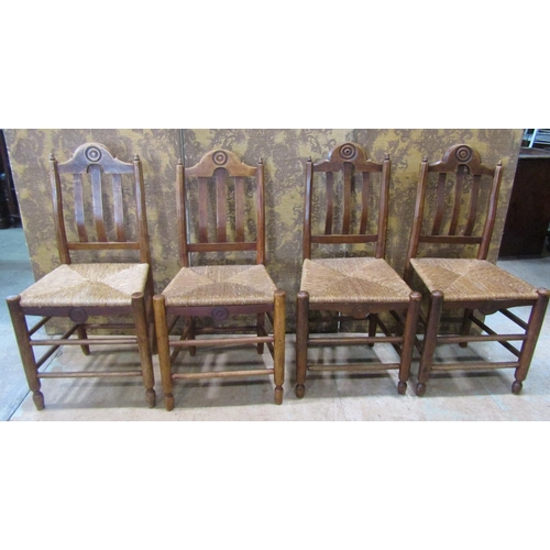 2187 - A set of four 19th century French provincial mixed wood dining chairs with rush seats, open slatted ... 