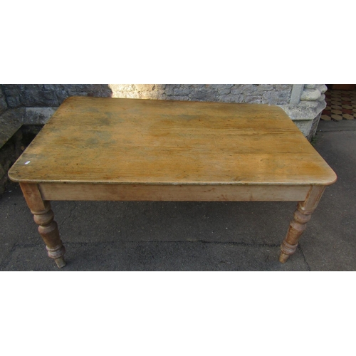 2190 - A Victorian stripped pine farmhouse kitchen table, the rectangular top with moulded outline and roun... 