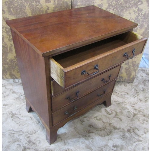 2193 - A small good quality Georgian style mahogany chest of four long graduated drawers with shaped apron ... 