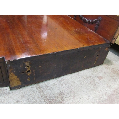 2209 - A Regency mahogany pedestal sideboard with carved and applied ribbon and garland decoration includin... 