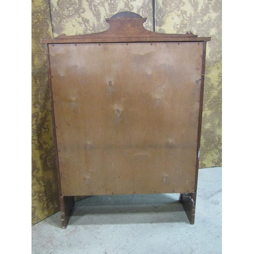 2211 - An Edwardian mahogany side cupboard with leaded light doors and two frieze drawers