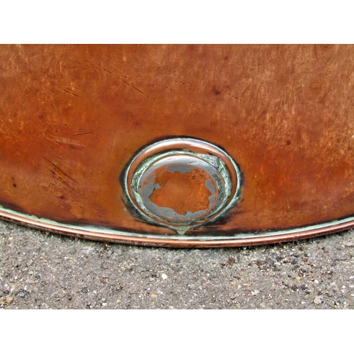 2222 - A 19th century copper tub of cylindrical tapering form with loop handles, 46 cm wide