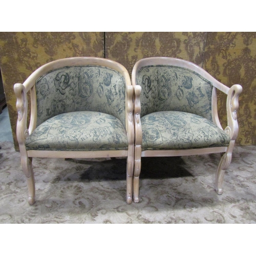 2319 - A pair of bleached beechwood tub chairs in an Empire manner with swan neck detail on shaped supports... 