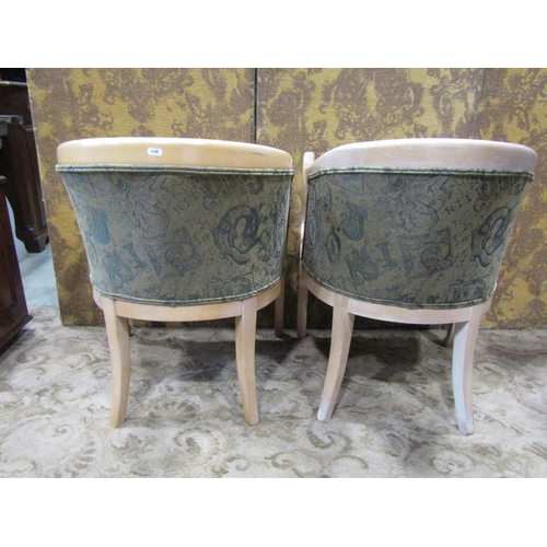 2319 - A pair of bleached beechwood tub chairs in an Empire manner with swan neck detail on shaped supports... 