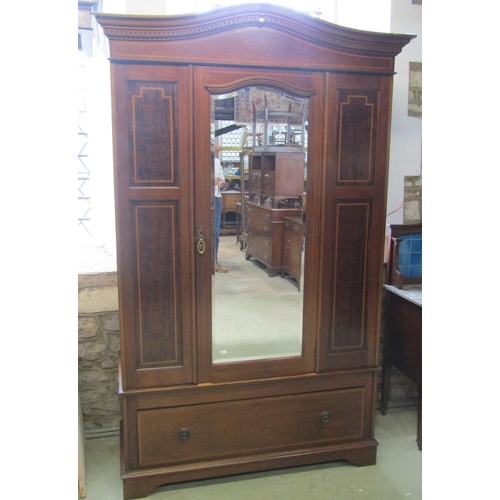 2352 - A good quality inlaid Edwardian mahogany wardrobe with mirror panelled door over a single frieze dra... 