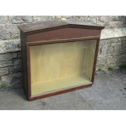 2367 - A Victorian pine wall mounted shop display cabinet with glazed panelled front, set beneath an archit... 